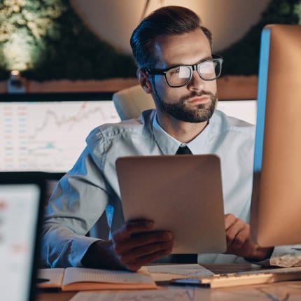 A male expert making data driven decisions as a part of website consulting firm methodology